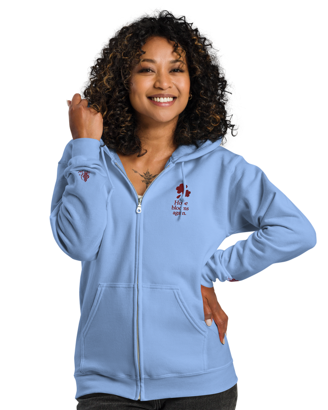 Unisex heavy blend zip hoodie with embroidered theme: Hope Blooms Again