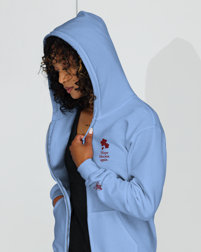 Unisex heavy blend zip hoodie with embroidered theme: Hope Blooms Again