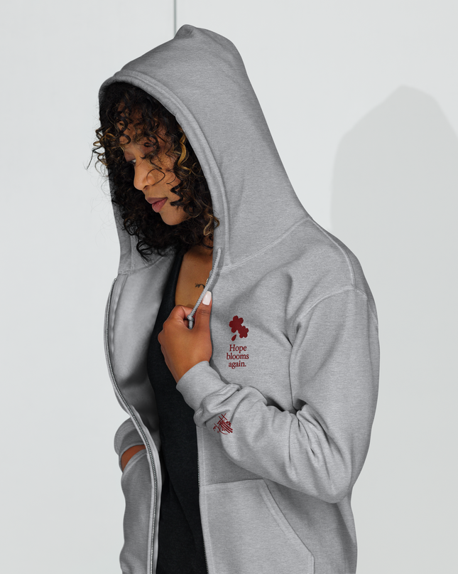Unisex heavy blend zip hoodie with embroidered theme: Hope Blooms Again