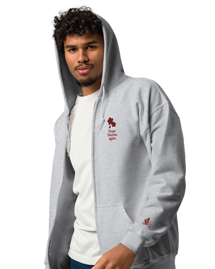 Unisex heavy blend zip hoodie with embroidered theme: Hope Blooms Again