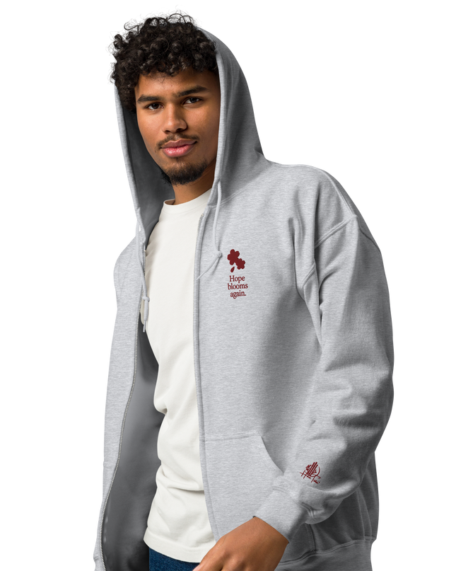 Unisex heavy blend zip hoodie with embroidered theme: Hope Blooms Again