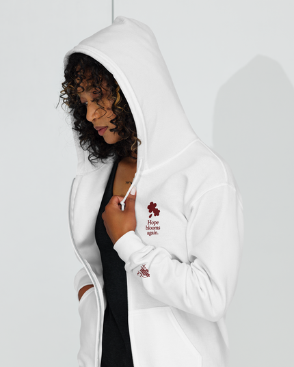 Unisex heavy blend zip hoodie with embroidered theme: Hope Blooms Again
